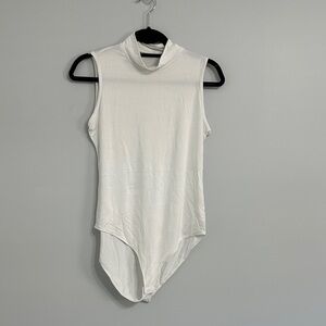 Elegant White Mock Turtleneck Sleeveless Bodysuit